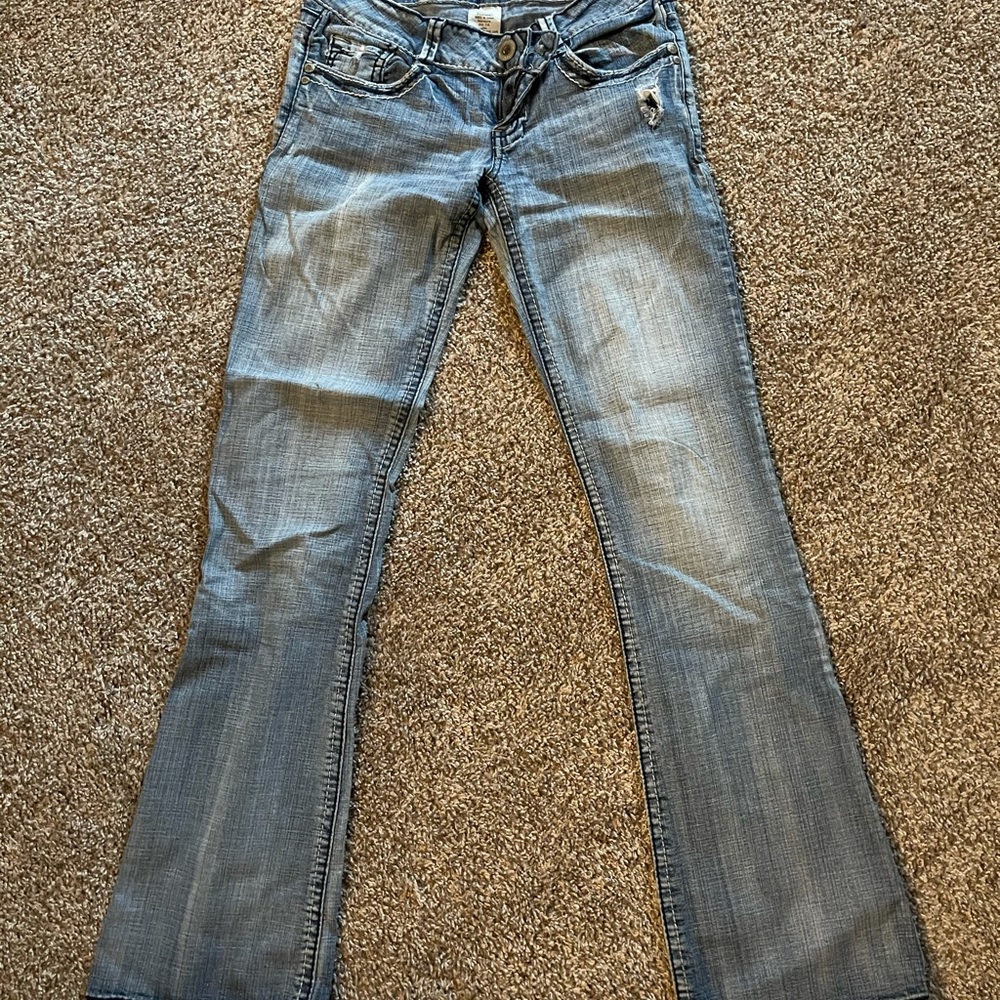 Hydraulic light washed jeans